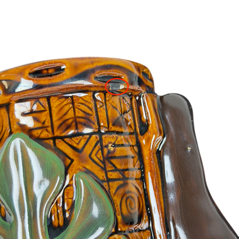 Detailed view of Alua Wahines Tiki Mug Mark Swanson Tiki Farm showcasing intricate designs and textures