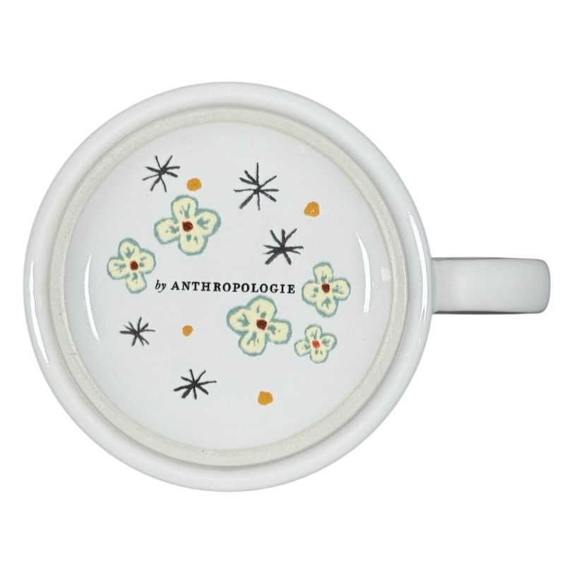 Alexandre Dumas G monogram initial mug white ceramic top view with green floral interior print by Anthropologie