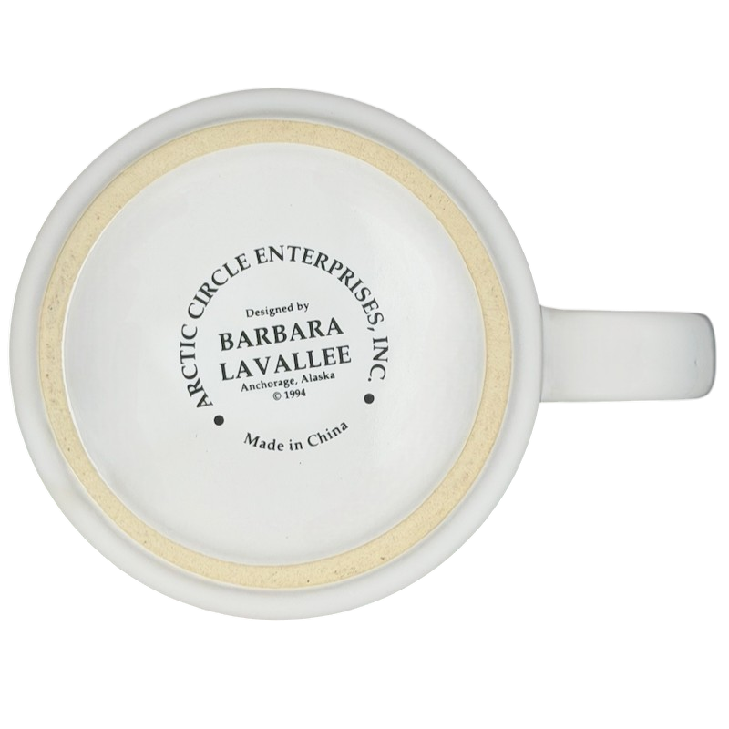 Underside view of Inuit Children Swinging Barbara Lavallee Mug from Arctic Circle Enterprises