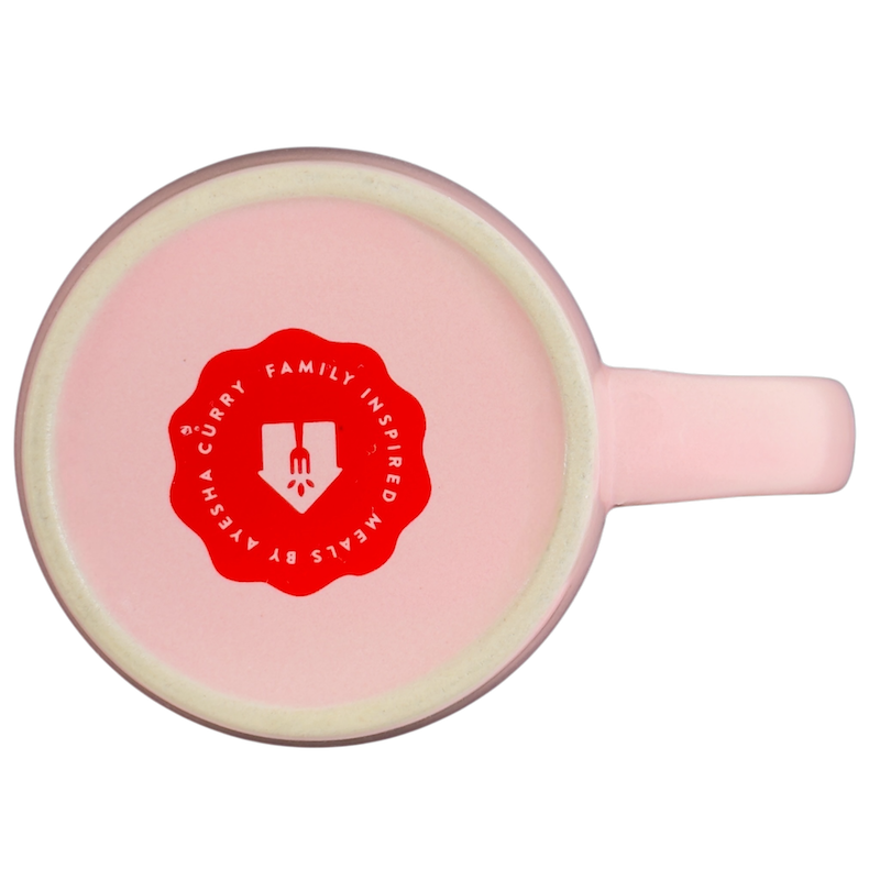 Bottom view of Love You A Latte FabFitFun Mug Ayesha Curry with a pink finish and logo