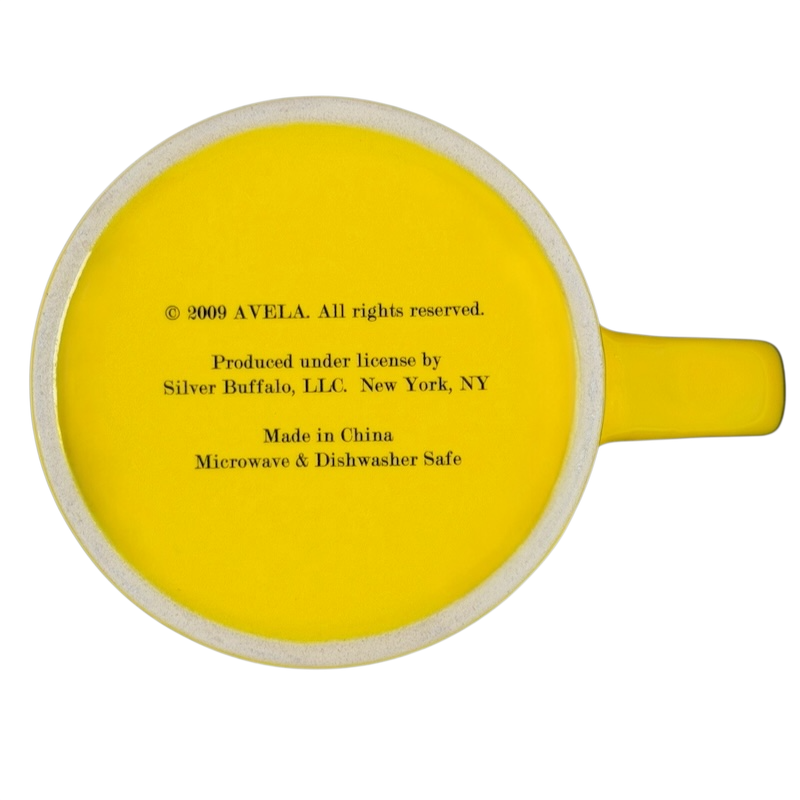 Bottom view of Beatles Yellow Submarine Mug Silver Buffalo featuring bright yellow color and care instructions
