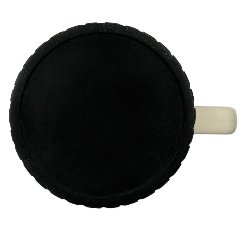 Black bottom view of Busted Knuckle Garage Logo Tire Base Mug by Open Road Brands