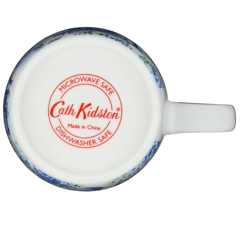 Bottom view of a Cath Kidston London mug with safe labels for microwave and dishwasher use