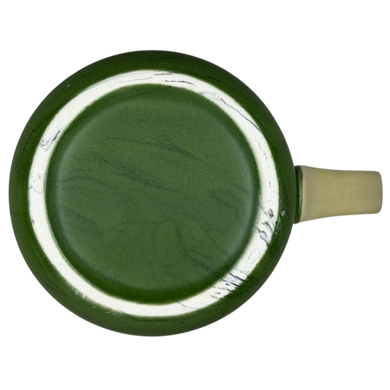 Top view of a Colorado fast food bear mug collectible in green with a unique marbled design