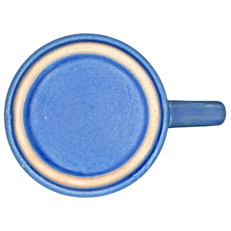 Top view of a blue ceramic Deer Logo Mug Caribou Coffee with a smooth finish