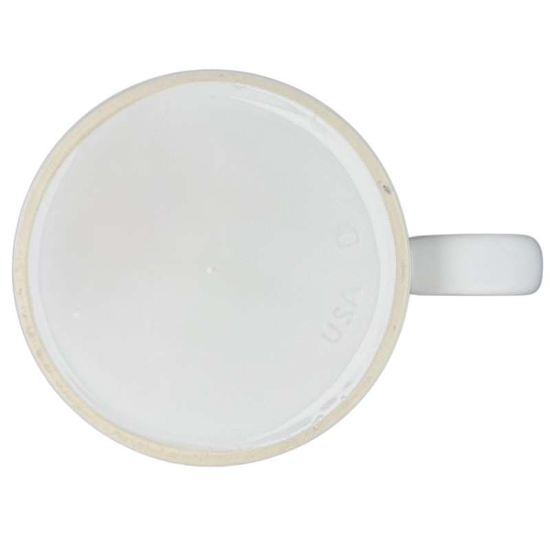 Bottom view of a white Donald Duck morning mood jumbo mug showcasing its smooth surface