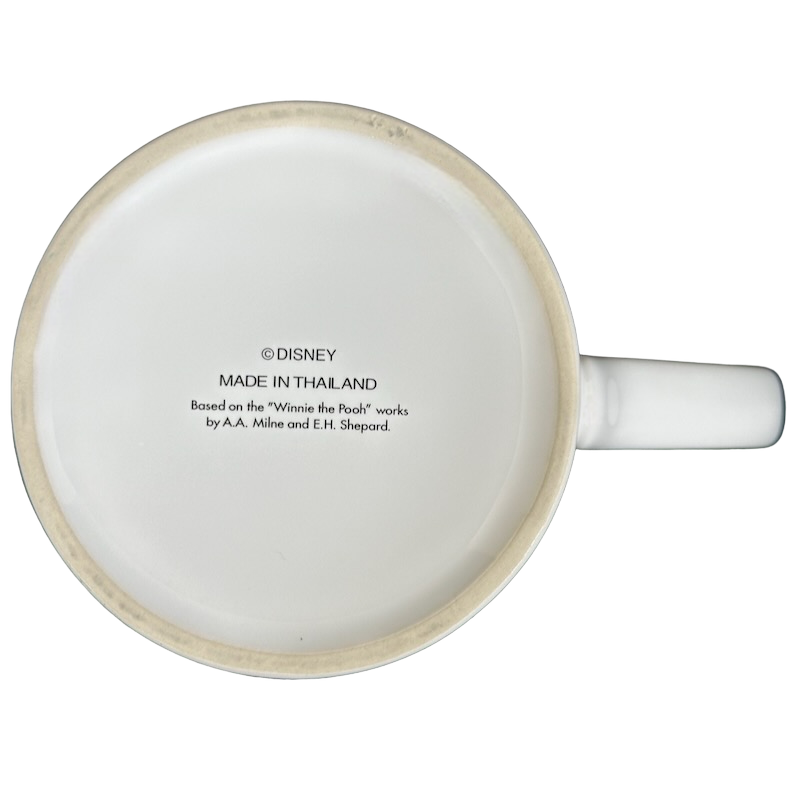 Bottom view of a Winnie The Pooh Embossed Mug Disney with branded markings and made in Thailand indication
