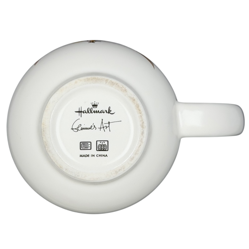 Bottom view of Hallmark Geninne's Art Love Wins mug with signature and manufacturing details