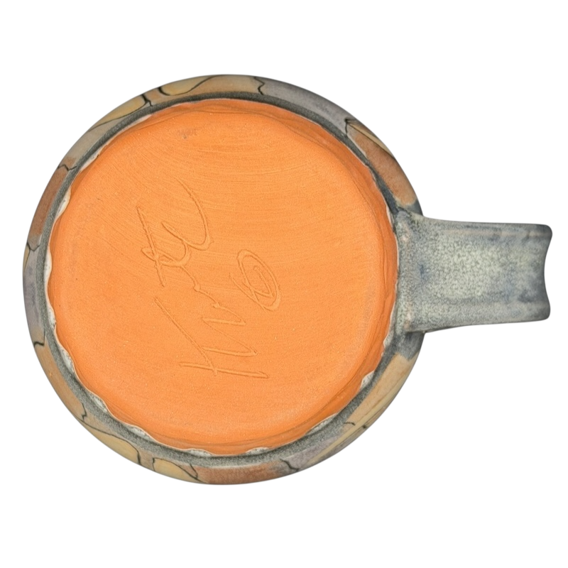 Handcrafted mountain wilderness animal pottery mug with a unique design and creator's signature on the base