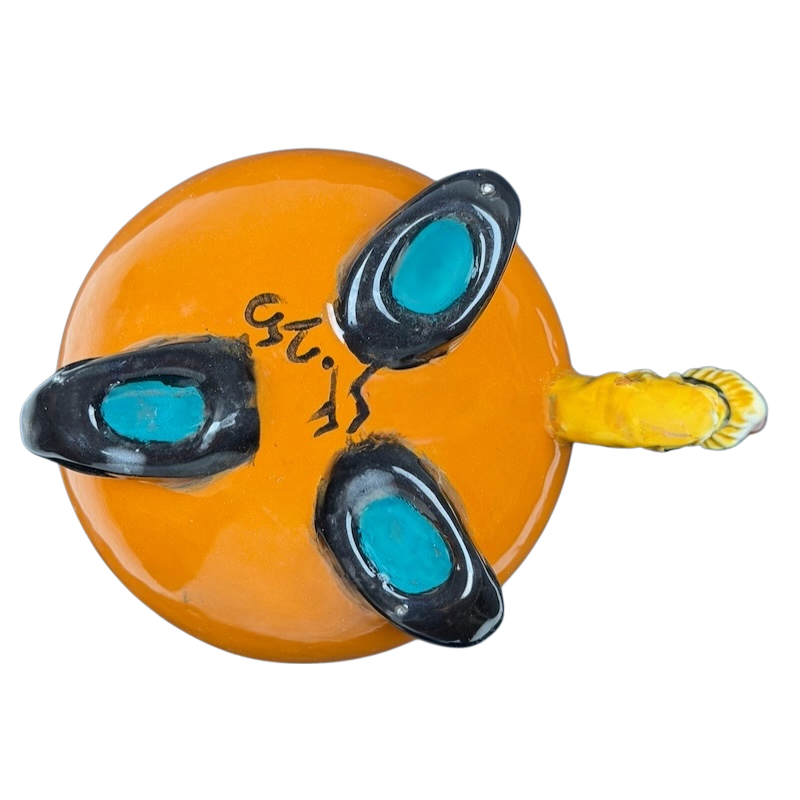 Unique handmade witch cauldron mug in orange with black and turquoise accents