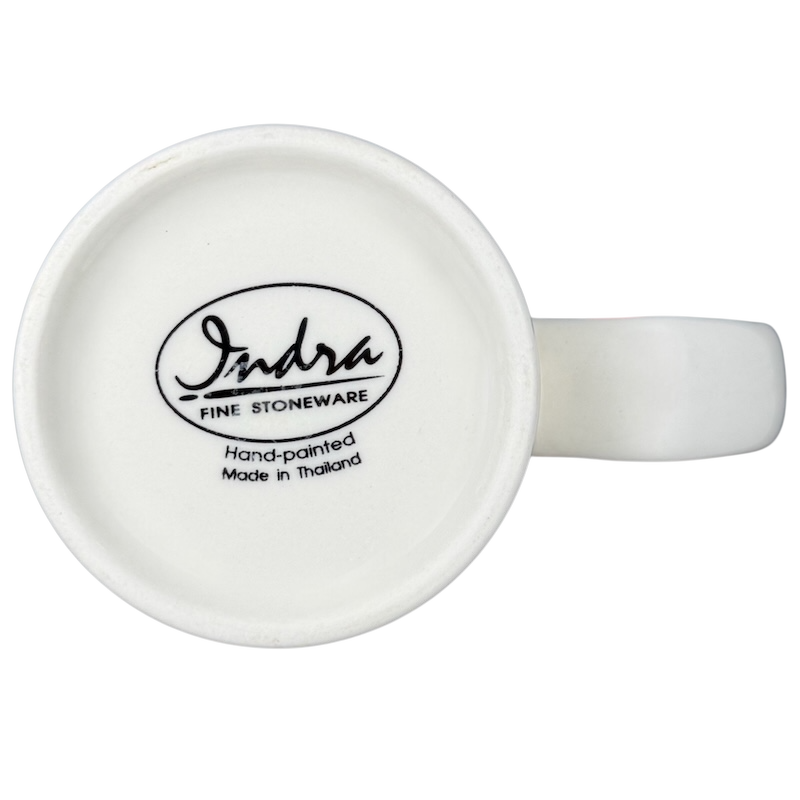 Indra Heart Polka Dot Piggy handle mug featuring a unique design and hand-painted finish