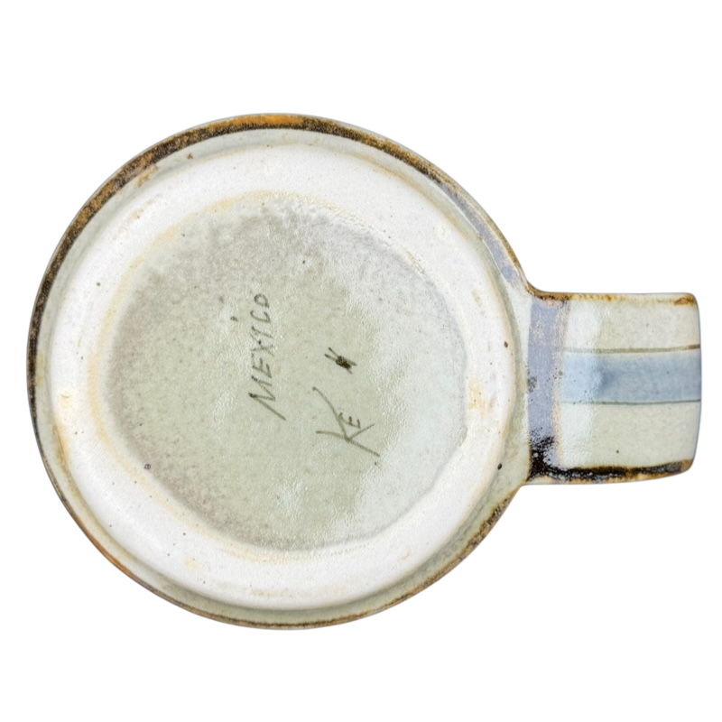 Bottom view of Ken Edwards Mexican pottery quail mug showcasing the artist's signature and detailed craftsmanship