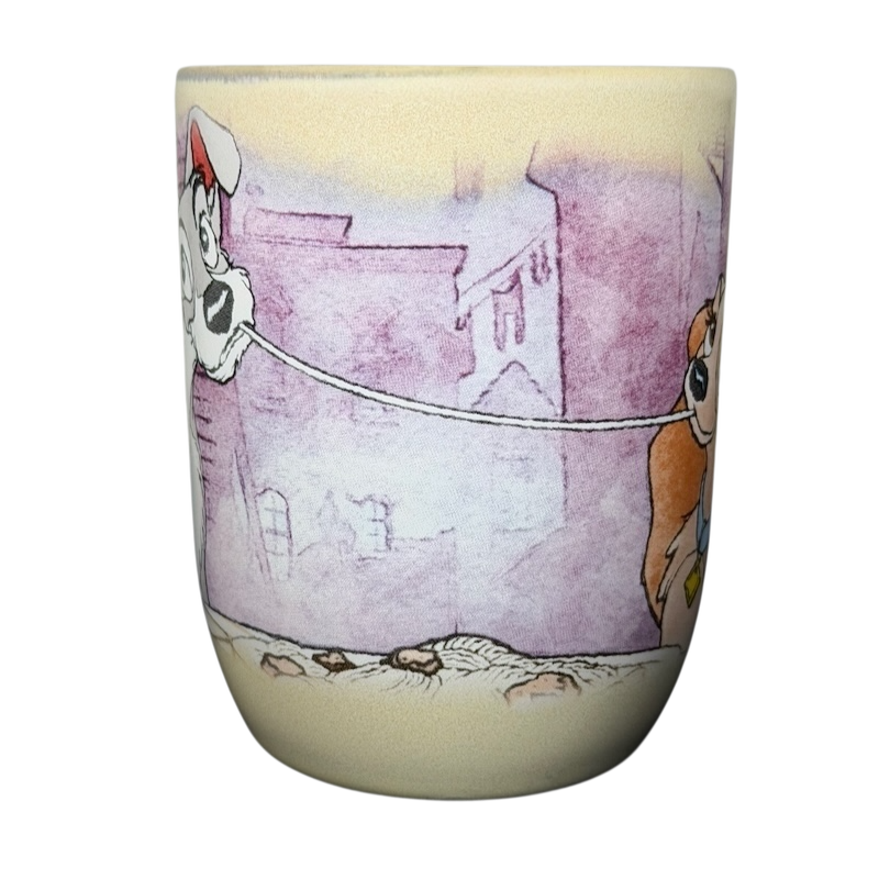 Disney Lady and the Tramp collectible mug featuring Tramp and Lady design on a pastel background