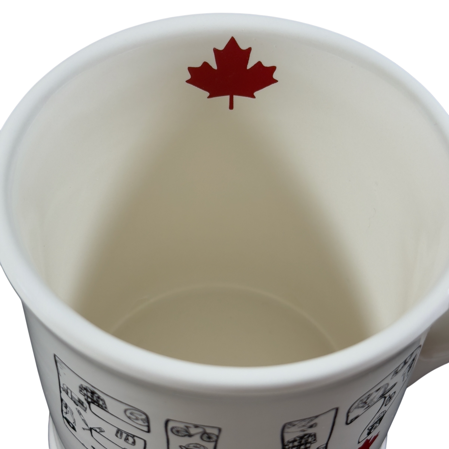 Magenta vintage Canada mug white ceramic cup with red maple leaf inside rim and black designs outside