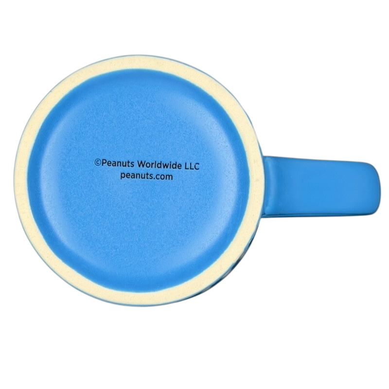 Top view of a blue Snoopy silhouette polka dot mug showing a smooth rim and sturdy handle