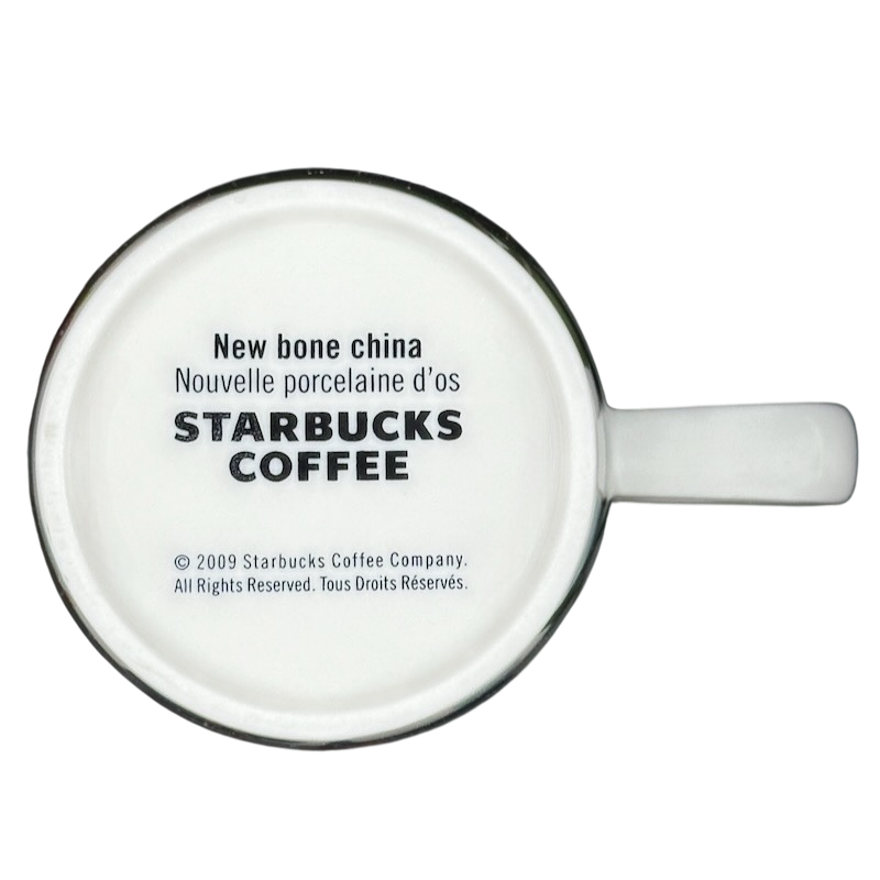 2009 Starbucks floral mug with detailed branding and new bone china material