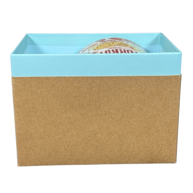 2018 Starbucks South Dakota Collectible mug partially visible inside blue and brown gift box