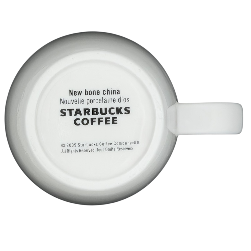 Bottom view of Starbucks Abbey ESTD 1971 New Bone China Mug 2009 showcasing the brand logo and design details