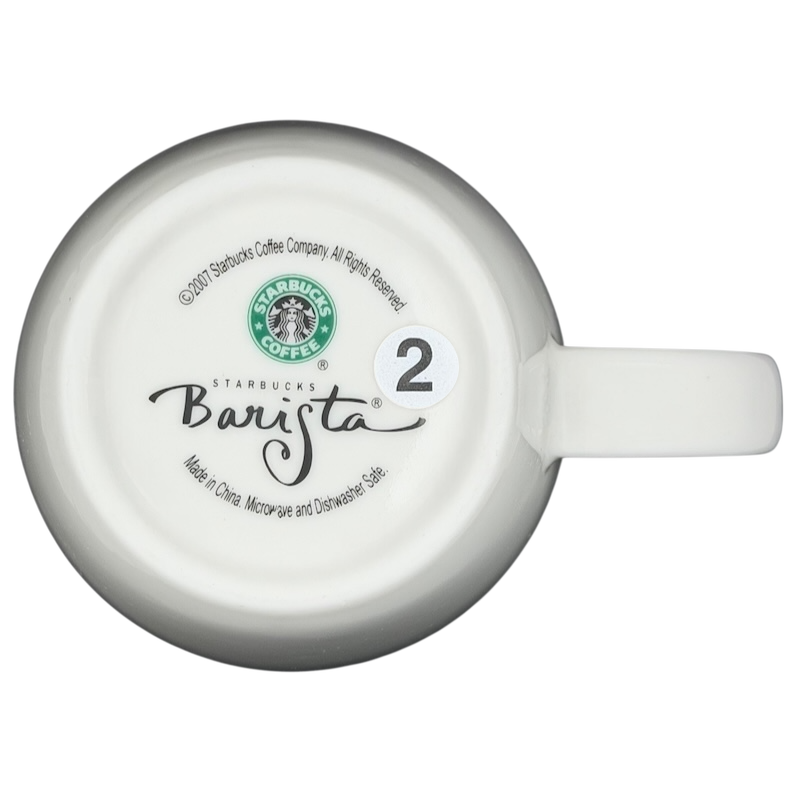 Bottom view of Starbucks Barista Abbey ESTD 1971 Mug 2007 showing logo and care instructions