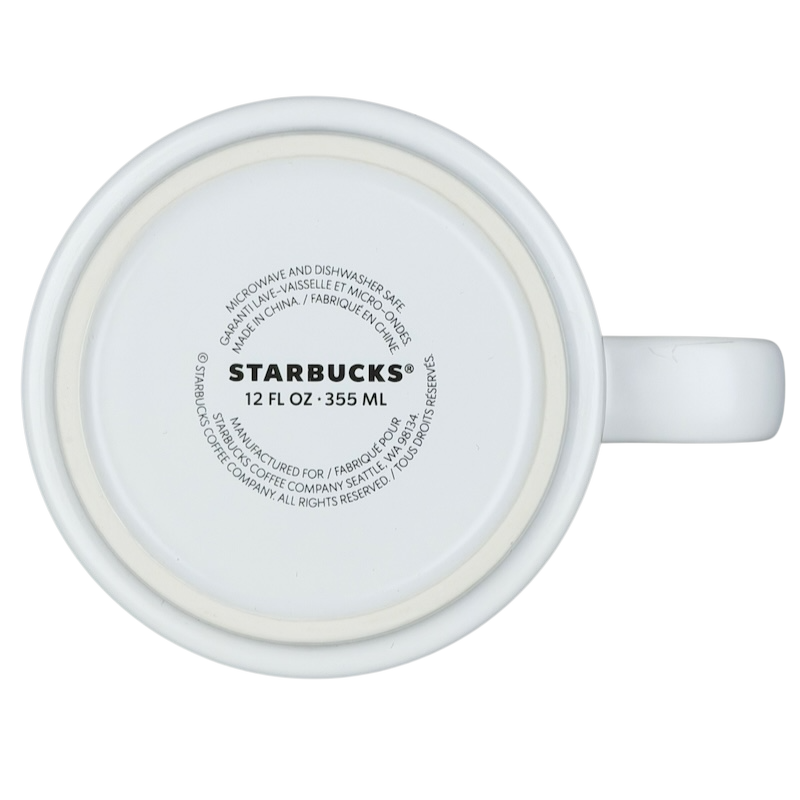 Bottom view of the collectible Starbucks subway tile mug showcasing care instructions and mug details