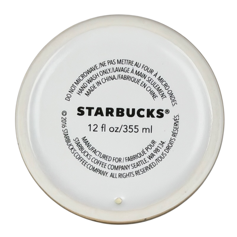 Bottom view of Starbucks Siren Tattoo collectible Tumbler with care instructions and capacity details