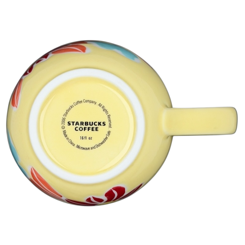 Starbucks spring butterfly vintage mug in yellow with colorful floral designs on the exterior