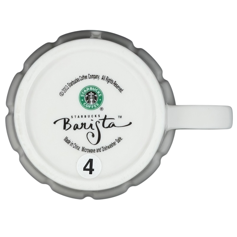 Bottom view of vintage Starbucks white siren ribbed mug featuring Barista branding and care instructions