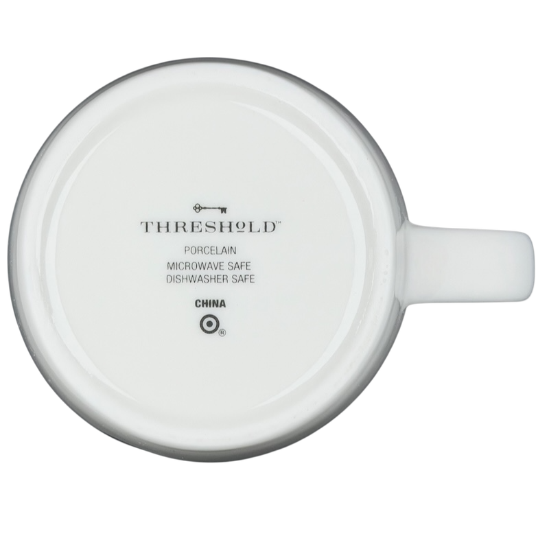 Bottom view of Threshold Scorpio astrology mug collectible with porcelain details and care instructions