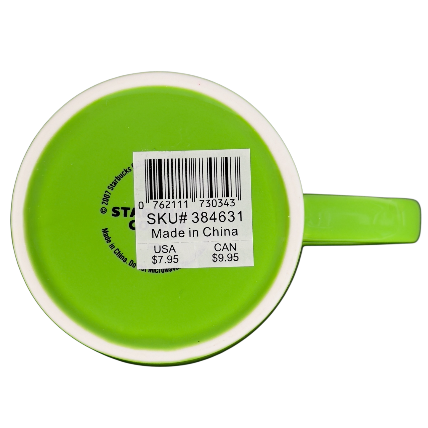 Bottom view of vintage Starbucks green sand pail mug with price sticker and barcode