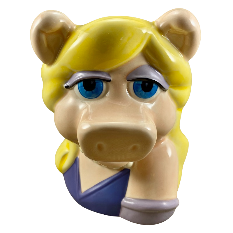 Vintage collectible mugs featuring Miss Piggy with blonde hair and blue eyes