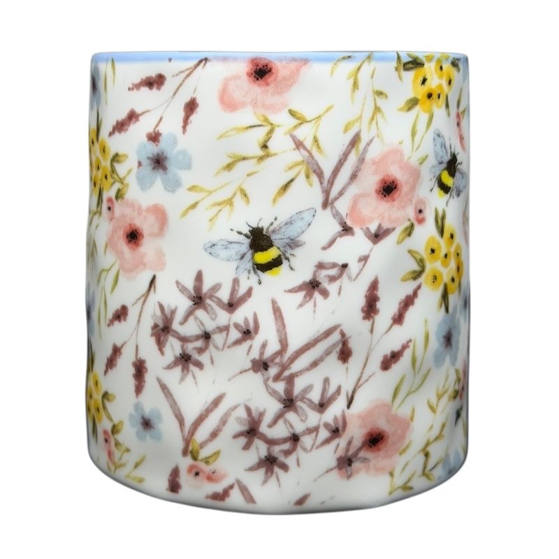 10 Strawberry Street bumblebee wildflowers mug featuring colorful floral designs and bees