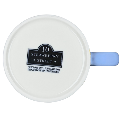 Bottom view of 10 Strawberry Street bumblebee wildflowers mug showcasing logo and care instructions