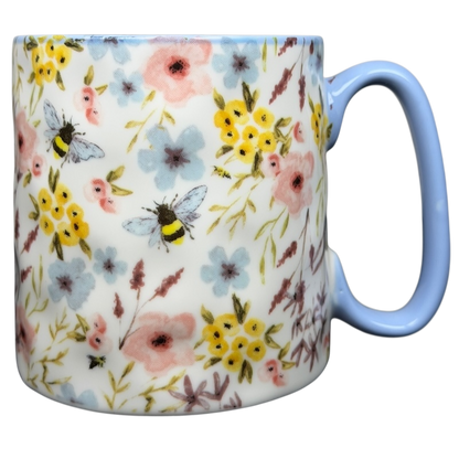 10 Strawberry Street bumblebee wildflowers mug featuring a floral design with bees and pastel colors