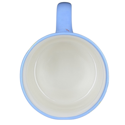 Inside view of 10 Strawberry Street bumblebee wildflowers mug with a soft blue finish
