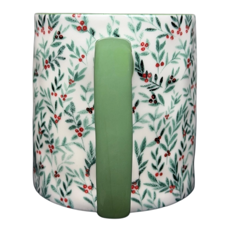 10 Strawberry Street Christmas mug with festive green handle and holly leaf design