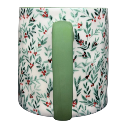 10 Strawberry Street Christmas mug with festive green handle and holly leaf design