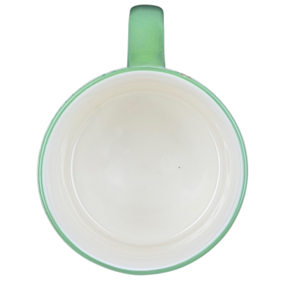 10 Strawberry Street Christmas mug with a smooth green exterior and spacious interior for holiday beverages