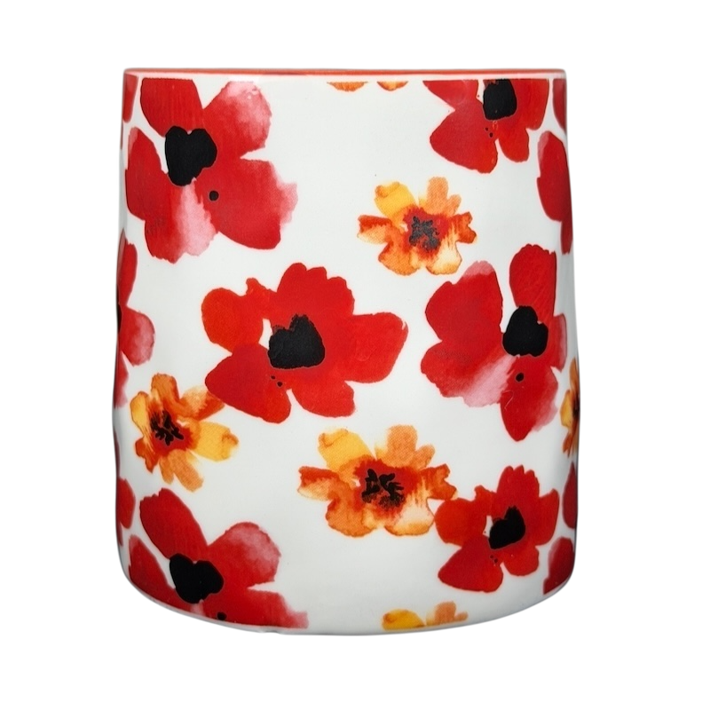 10 Strawberry Street orange red poppy mug featuring vibrant floral patterns on a white background