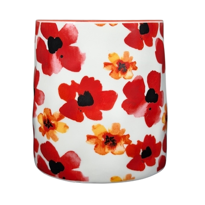 10 Strawberry Street orange red poppy mug featuring vibrant floral patterns on a white background