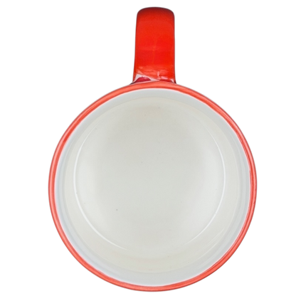 Top view of 10 Strawberry Street orange red poppy mug highlighting its vibrant color and smooth interior