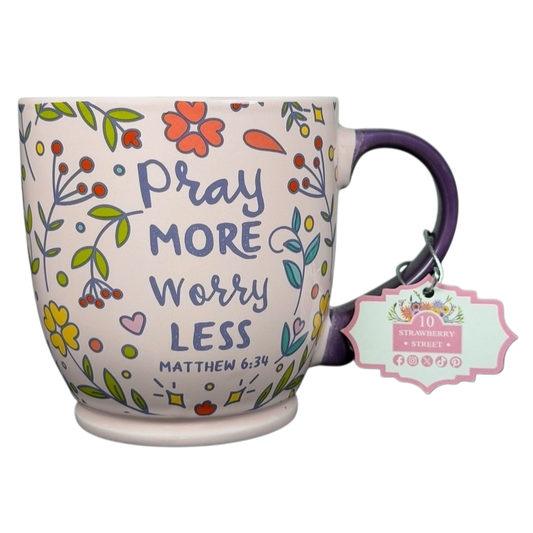 Colorful 10 Strawberry Street mug featuring 'pray more worry less' design with floral accents