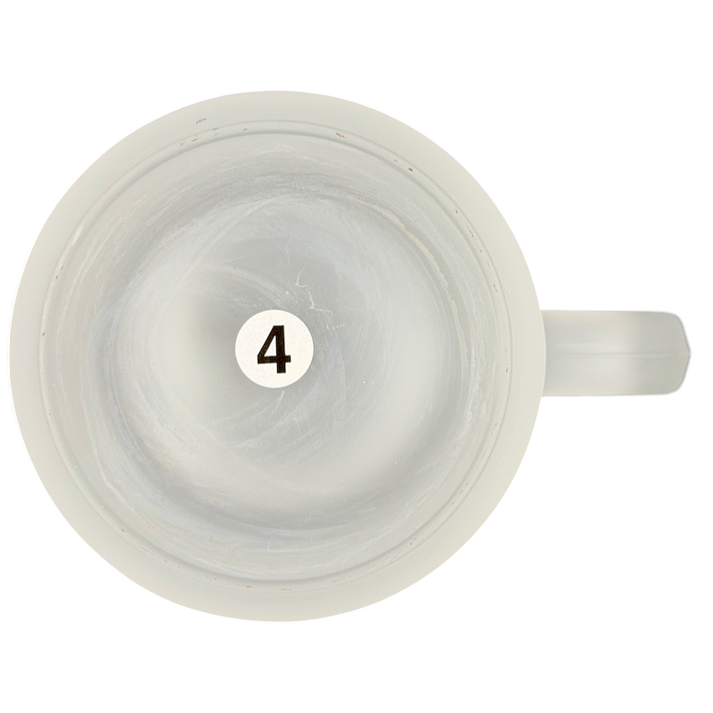 Top view of the Pebble Beach 100th U.S. Open 2000 Commemorative Frosted Glass Mug showing the interior design