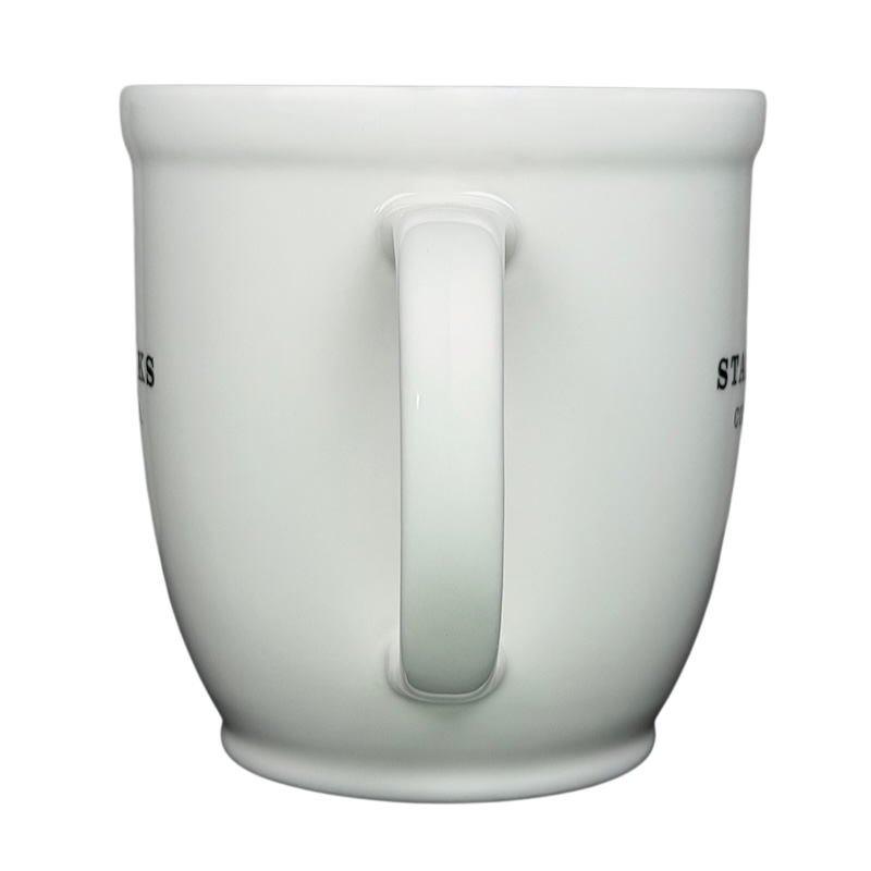 2007 Starbucks Abbey ESTD 1971 mug featuring a classic white design with a sturdy handle
