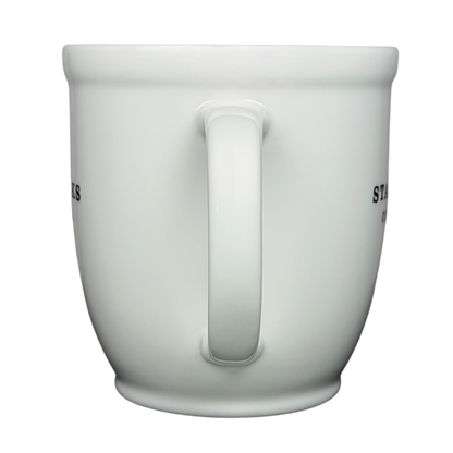 2007 Starbucks Abbey ESTD 1971 mug featuring a classic white design with a sturdy handle