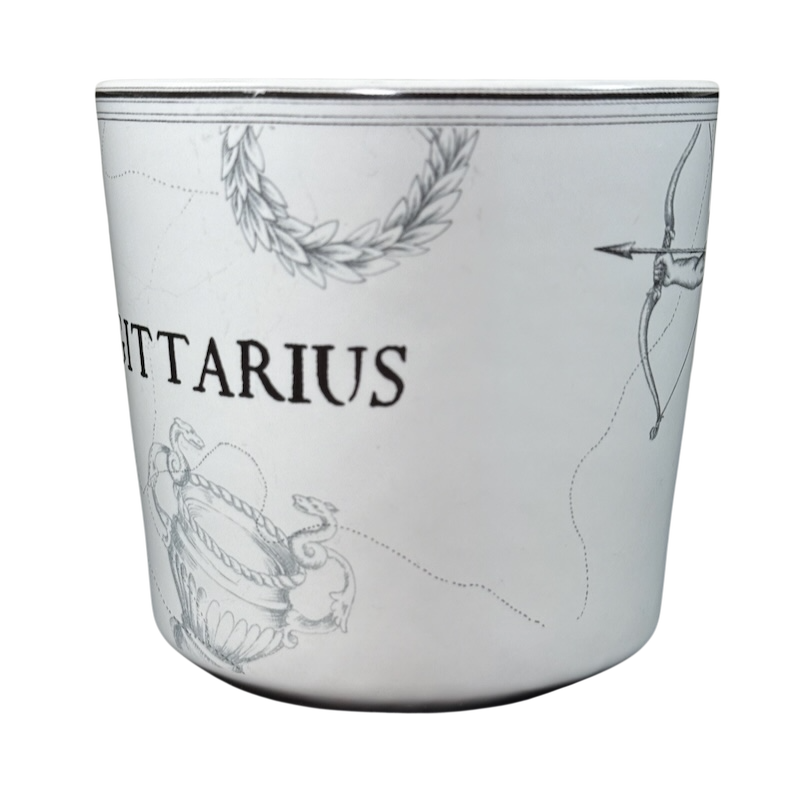 Williams Sonoma astrology mug featuring Sagittarius zodiac sign with detailed black and white design