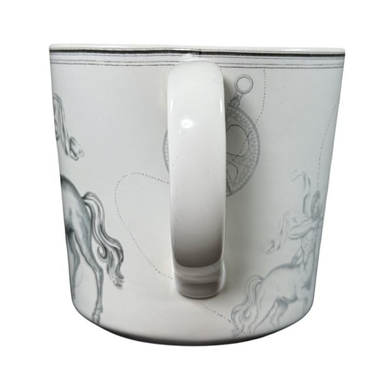 Williams-Sonoma Rory Dobner astrology mug with black and white zodiac horse illustrations and a central handle
