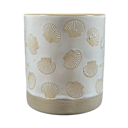 White ceramic sea shell under the sea coffee mug with embossed seashell design and natural base