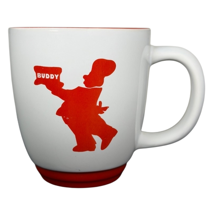 Carlo's Bake Shop collectible mug featuring a red silhouette of Buddy holding a cake