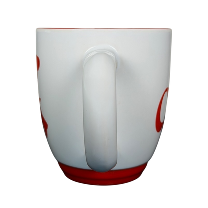 Carlo's Bake Shop collectible mug with a red bottom and handle in a simple white design
