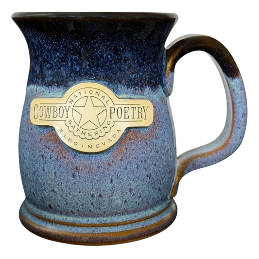 Handcrafted ceramic Cowboy Poetry mug Elko Nevada with a rustic design and star emblem